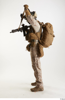 Casey SchneiderParatrooper in Desert Marpat Pose 6 holding gun standing…